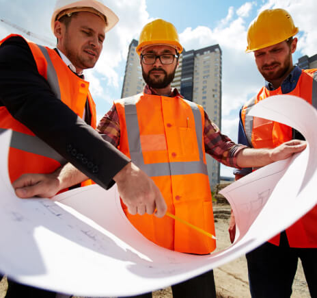 Hard hatswork at the heavy manufacturing factory industrial